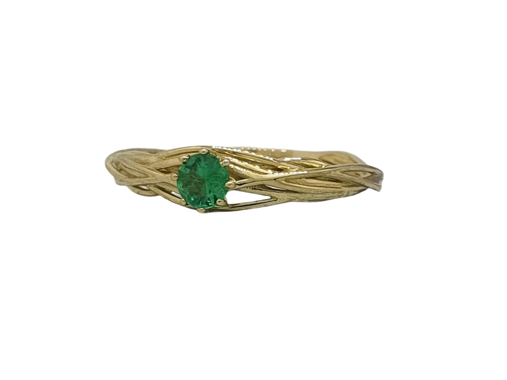 Unusual engagement ring with emerald, proposal ring