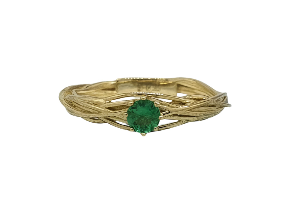 Unusual engagement ring with emerald, proposal ring